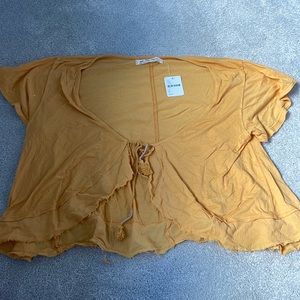 Yellow free people open tie top. Never worn tags still on!
